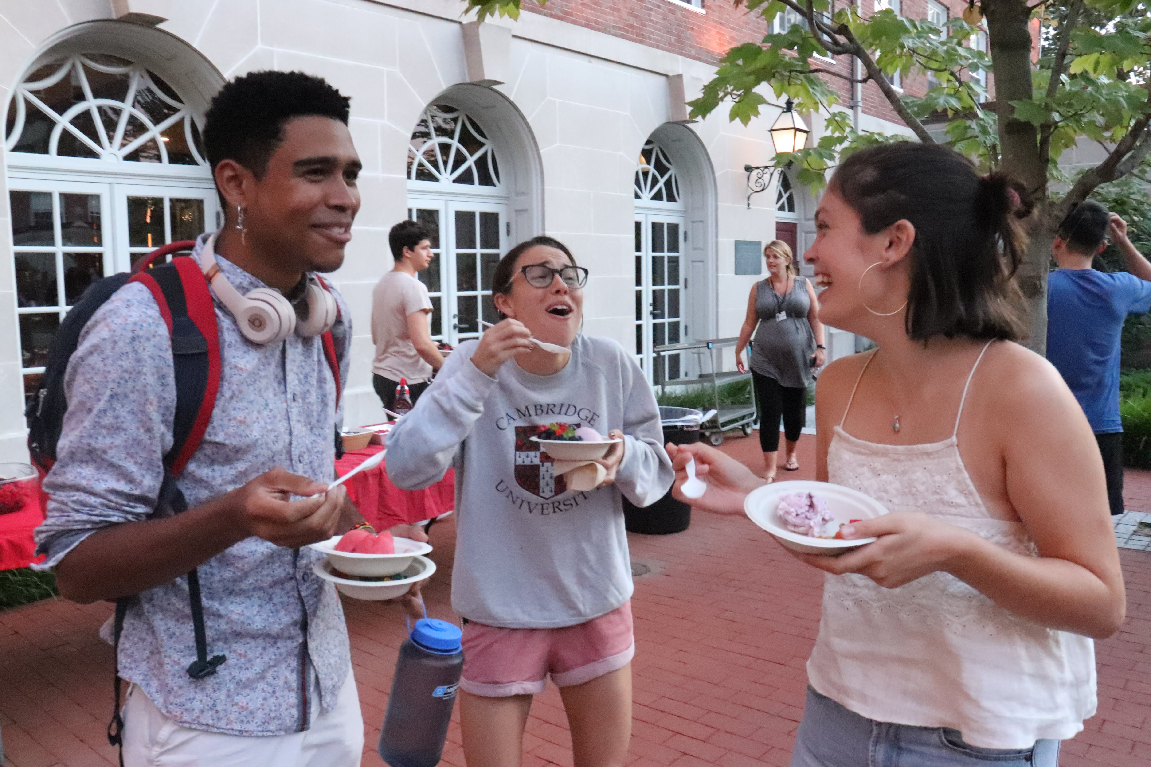 students laughing in Dunster courtyard