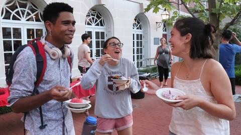 students laughing in Dunster courtyard