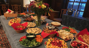 Table with many dishes of food