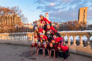 photo of student grille staff smiling together on Weeks Bridge